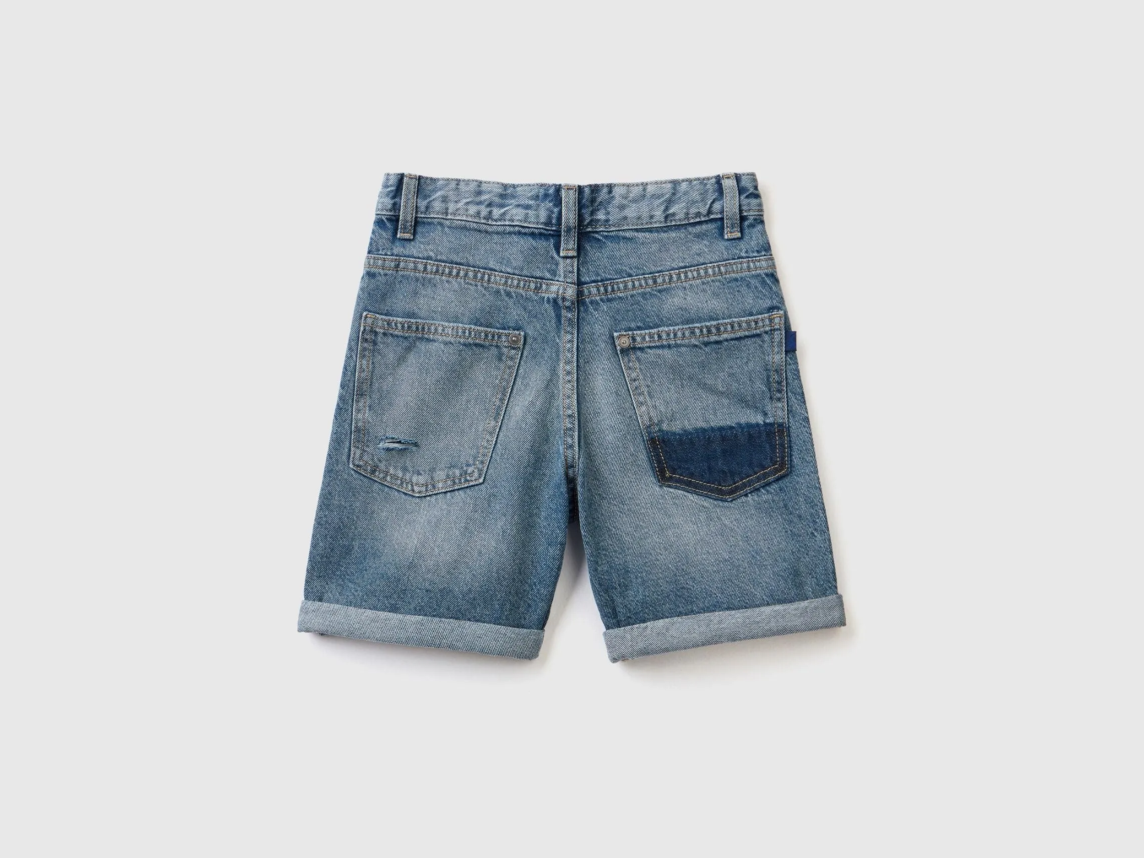 Denim bermudas with rips